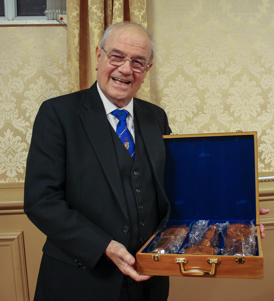 Stalwart Tony Bent presents a set of gavels to the Marquis of Lorne Lodge in celebration of his 50 Yrs in Freemasonry.