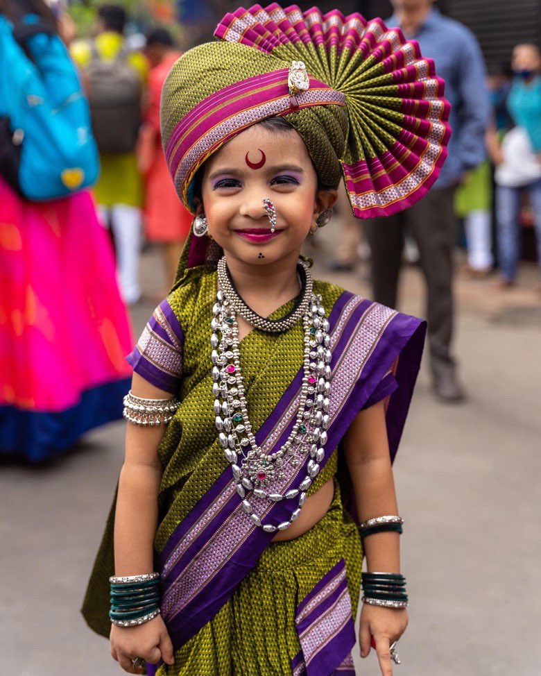 anandmahindra's tweet photo. Incredible India’s intense colours. And that child’s expression gives hope for a colourful New Year in which we will meet and gather together again…Glorious textures of Gudi Padwa celebrations in Girgaon, Mumbai this morning. (Pics By @ompsyram naturally) https://t.co/3n5o2cOZM5