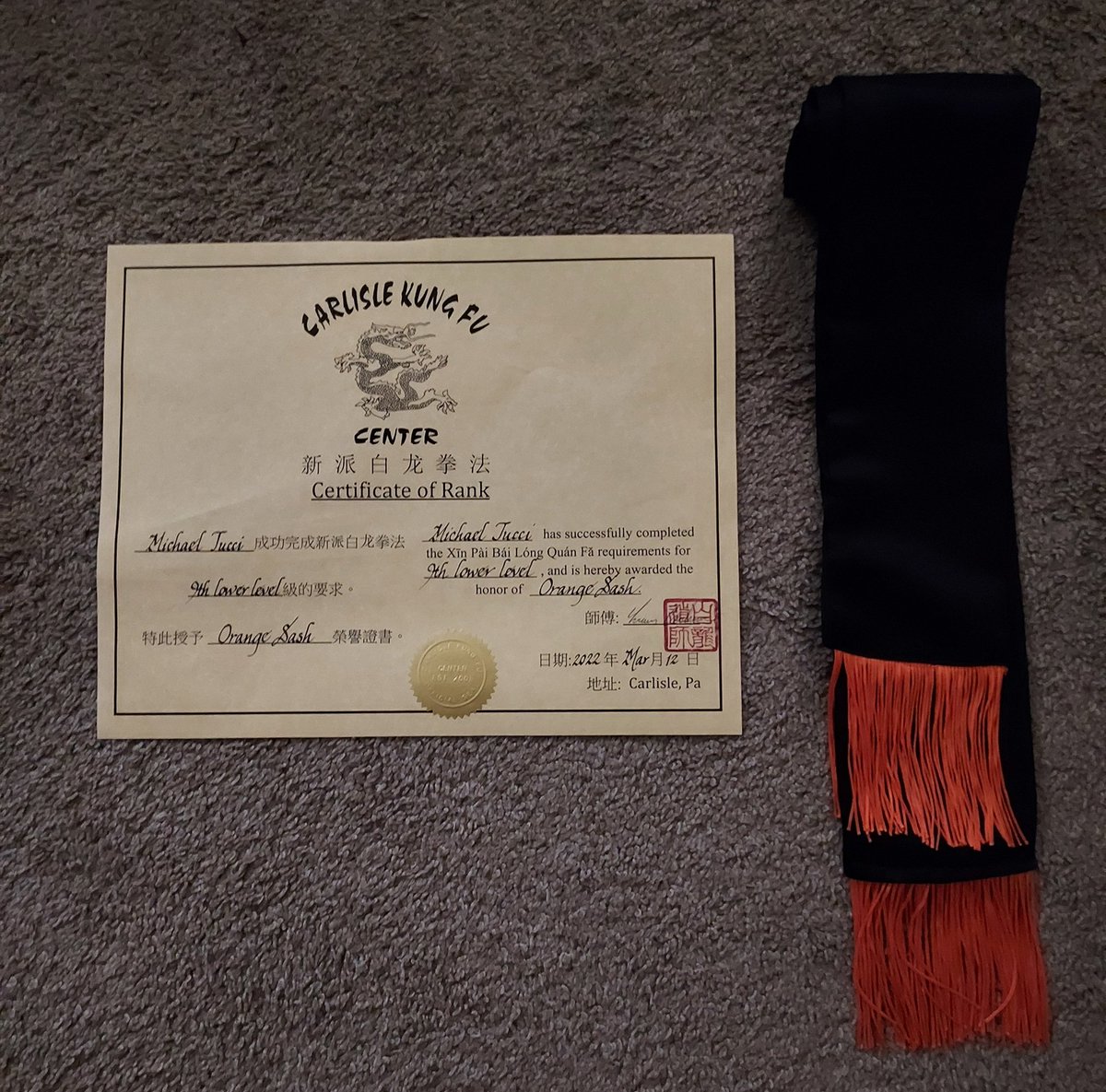 OldguyInspire's tweet photo. So, this happened yesterday. So stoked to pass my first Kung Fu test and advance from the beginner, 10th lower level, to the orange sash of the 9th lower level. 55 and strong! Never too late to start something completely new!! #kungfu #martialarts #donewstuff #learnsomethingnew https://t.co/Lk2QfjbpYU