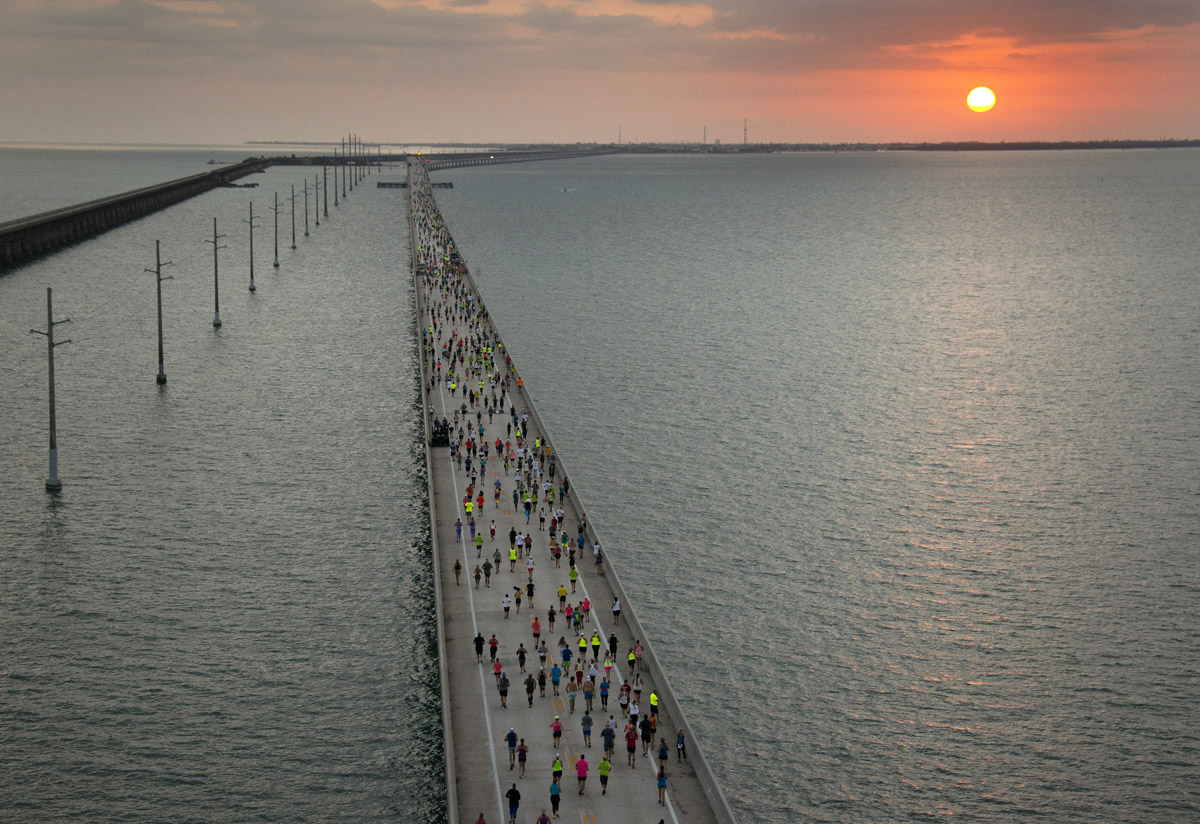 thefloridakeys's tweet photo. Congrats to all Saturday's 7 Mile Bridge Runners, treated to cool water spray & bubbles as they crossed the longest span along O-seas Hwy. 1st place male Collin Wainwright's time was 38:06; 1st place female Marathon's Holly Smith, in 43:23. #floridakeys #beatthebus ๐ธ Andy Newman https://t.co/6LLZ9w3A6F