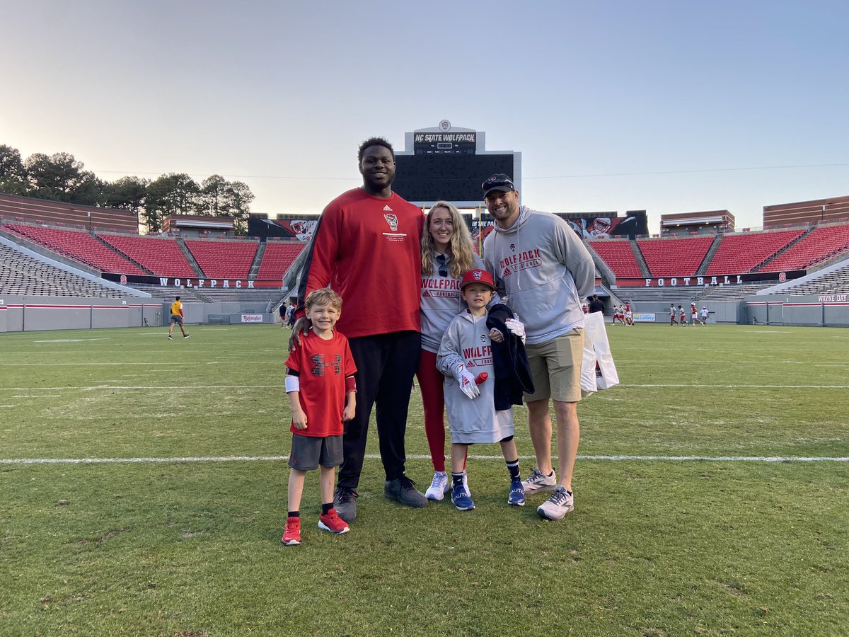 katieehenry12's tweet photo. Dear recruits, why pick @PackFootball?  Our house burned down 2 weeks ago, yesterday we were invited to practice, received an experience of a lifetime, bc they Care.  Wolfpack=family, once part of the PACK, good, bad or ugly, they got you. Thank you @_zaynlm @CoachTonyGibson https://t.co/hS4H7BrXPE