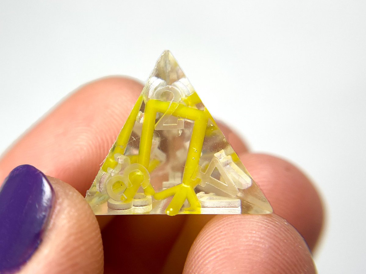 I had all these extra chick feet, so of course I had to put them in dice!  

#Dnd #dice #ttrpg #resinart #handmadedice