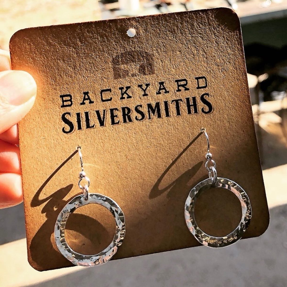 BackyardSilver's tweet photo. Handcrafted, pure .999 silver open circle drop earrings - ready to ship and a nice idea for #MothersDay2022 😊. #silverjewelry #earrings #BackyardSilversmiths #Waco #Texas https://t.co/cUzLXWNUcO https://t.co/Y1Fg3PTAnA