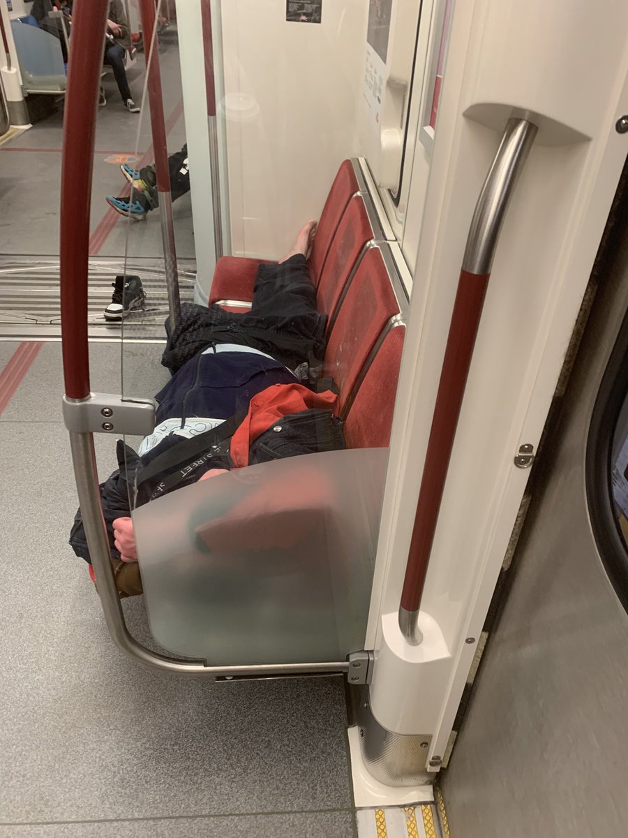 The homeless guy is sleeping in the subway and the other one who has blue shoes is yelling… we love homeless 🙃
#subway #ttc  #north subway 5695