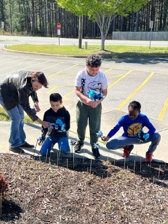 We are putting up pinwheels to show support for Child Abuse and Autism Awareness.
