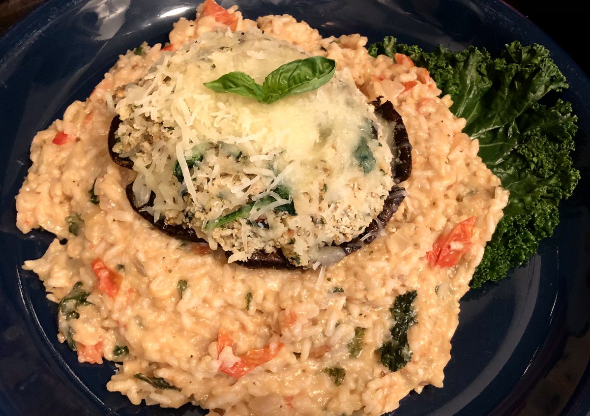 CaitlynPhD's tweet photo. When the #harvestbox brings kale, tomatoes, and portabellos, and your basil plant is out of control: time to make stuffed mushrooms and tomato-basil risotto #ChemistsWhoCook https://t.co/rvv2SMDWYY