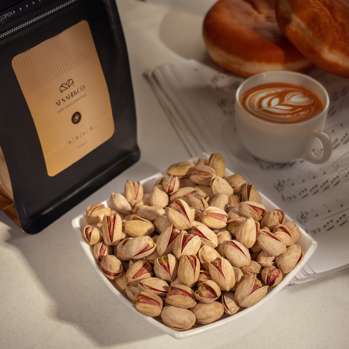AFSAHICO's tweet image. This pack contains 20 oz of premium jumbo pistachios in shells, which are roasted with salt and a touch of lemon. These roasted jumbo pistachios come from beautiful Middle Eastern orchards and are among the largest and highest quality pistachios harvested across the globe.