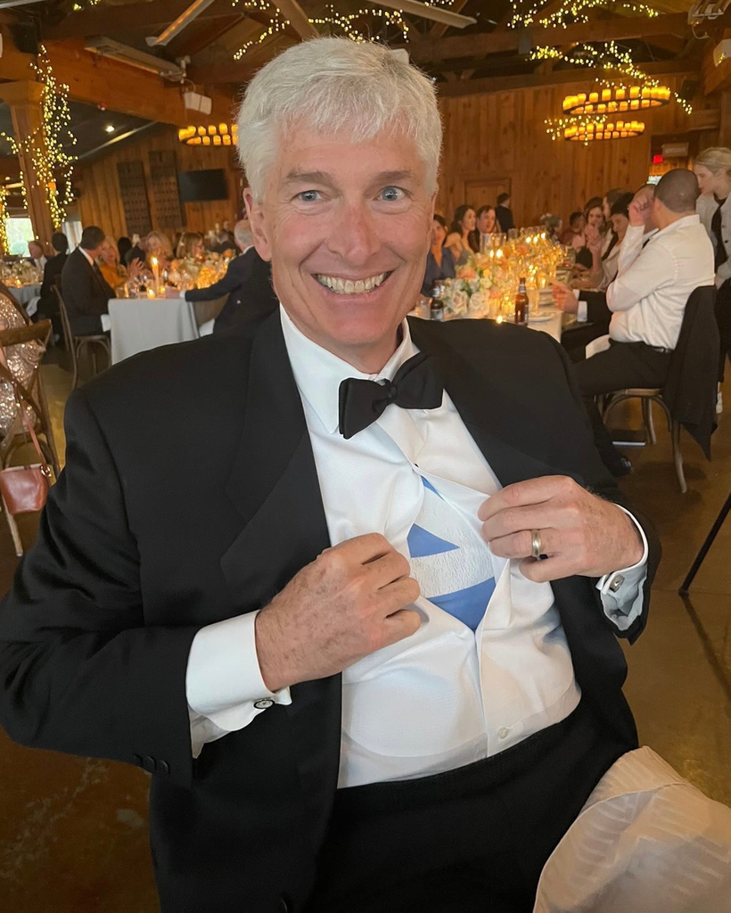 winstonsgrille's tweet photo. Superman has nothing on Charles. A little wedding last Saturday wasn’t going to stop him from being a UNC “super” fan. 🐏 https://t.co/XoC4KHbQFc https://t.co/yjinLZc9Qr