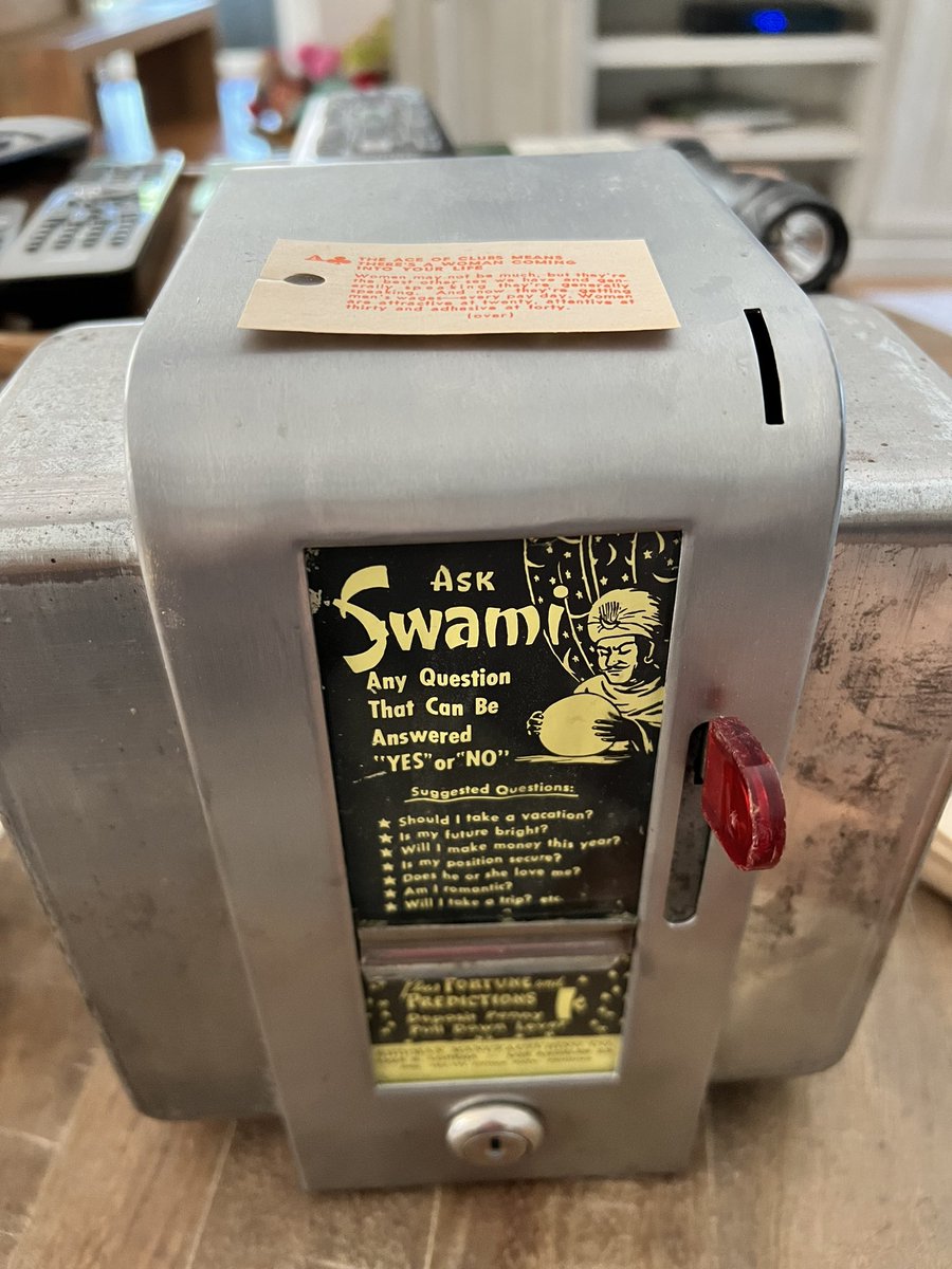 bobbydevito's tweet photo. Woah 🤯 this “Ask Swami” napkin dispenser from the 50s is too cool. From the @ronnyelliott stash, it even has extra fortunes. Of course, this is the one I got 🤣 #askswami https://t.co/91EB6ihhxp