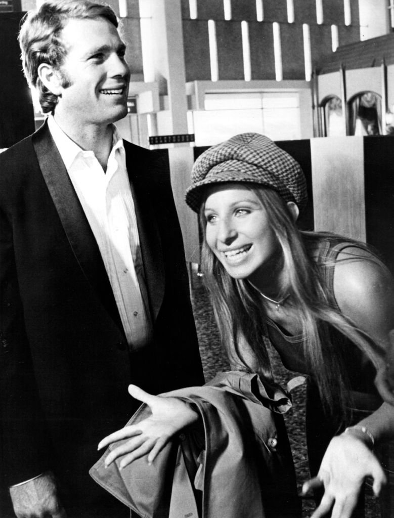 Ryan O'Neal and Barbra Streisand during a break from filming on the set of What's Up, Doc? (1972)