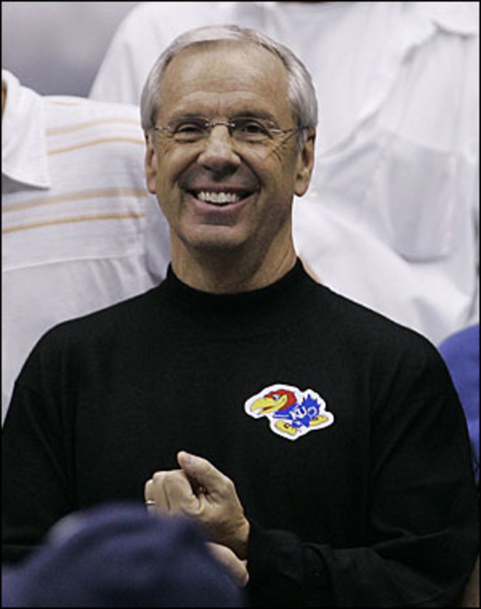 JayhawkTalk's tweet photo. I’m good if Roy wears Carolina blue but then also wears a Jayhawk sticker. We like Roy wearing a Jayhawk sticker. https://t.co/LwwEbg31jK