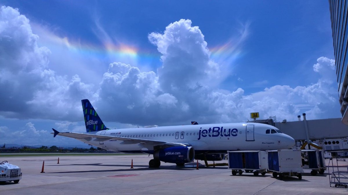 JetBlue's tweet photo. On a day like today, our favorite color is rainbow. 🌈 Find your own for #FindARainbowDay! (📸: Hector Padilla, Supervisor, SJU) https://t.co/7y9reJ3fle