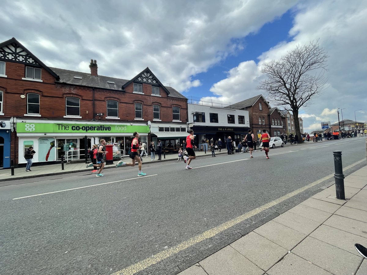 Fantastic atmosphere in #Saletown watching the #mcrmarathon runners go down Northenden Road