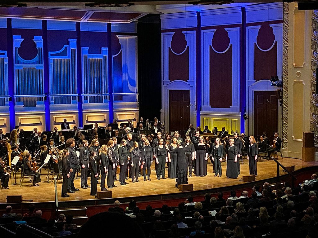 duqedu's tweet photo. In solidarity with the people of Ukraine, the @MPSoM student choir Voices of Spirit performed two beautiful songs at "A Concert for Peace: Humanitarian Relief for Ukraine" at Heinz Hall. Prof. of Music Education and Chair of Performance Dr. Stephen Benham also read a poem. https://t.co/HKTq2wXN7n