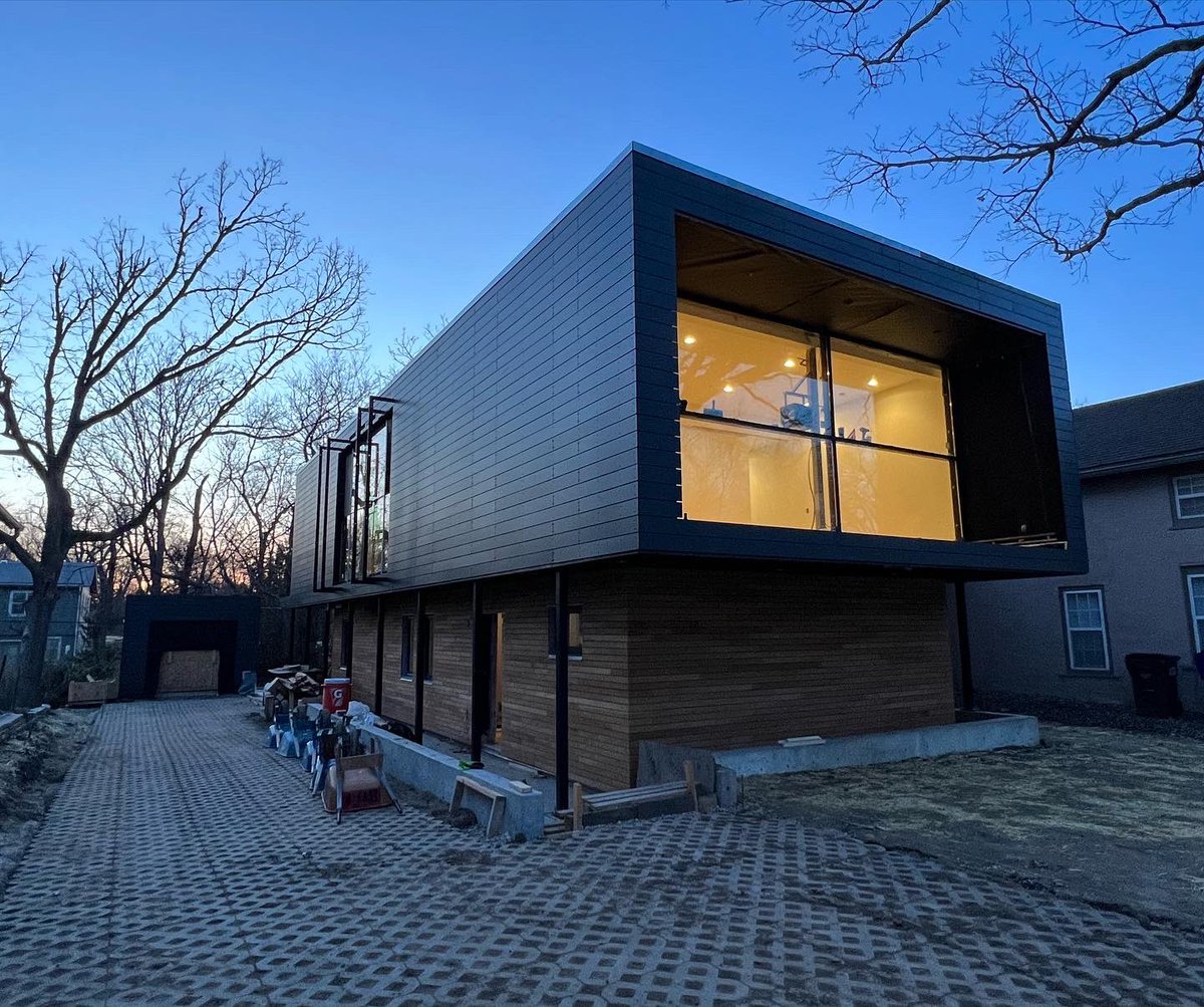studio804_23's tweet photo. The skin of the house has taken form! The first level is sassafras wood from Robi Decking and the second level is a material called Fundermax. https://t.co/POnvsUfyf4