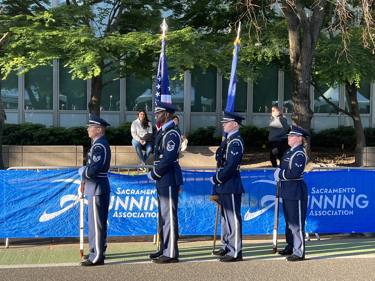 Miss Golden Valley, Dana Harrison 
sings the national anthem before the start of the 5K with the Travis Air Force Base Color Guard. #CUSactownRun #runsactown #CU4Kids #CUSacTown22 
@CU4Kids @CMNHospitals @runSRA_SIM