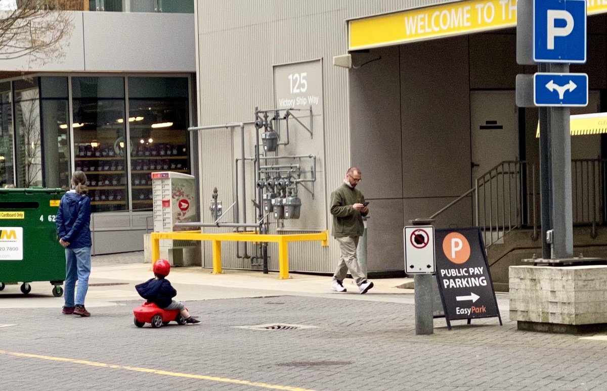 When is it okay for toddler to ride on the road? #theshipyards #cityofnorthvancouver Where is the #commonsense? #accidents waiting to happen.