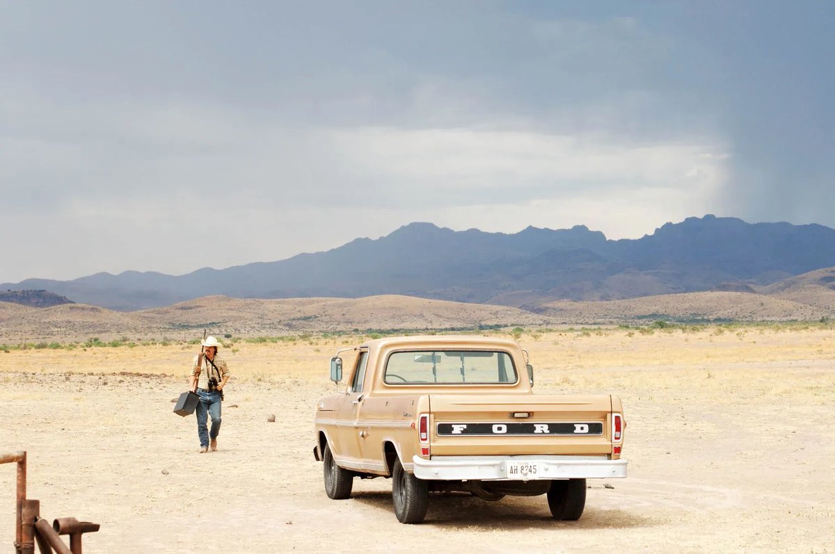 Four stills from a movie you believe is a masterpiece, no title.