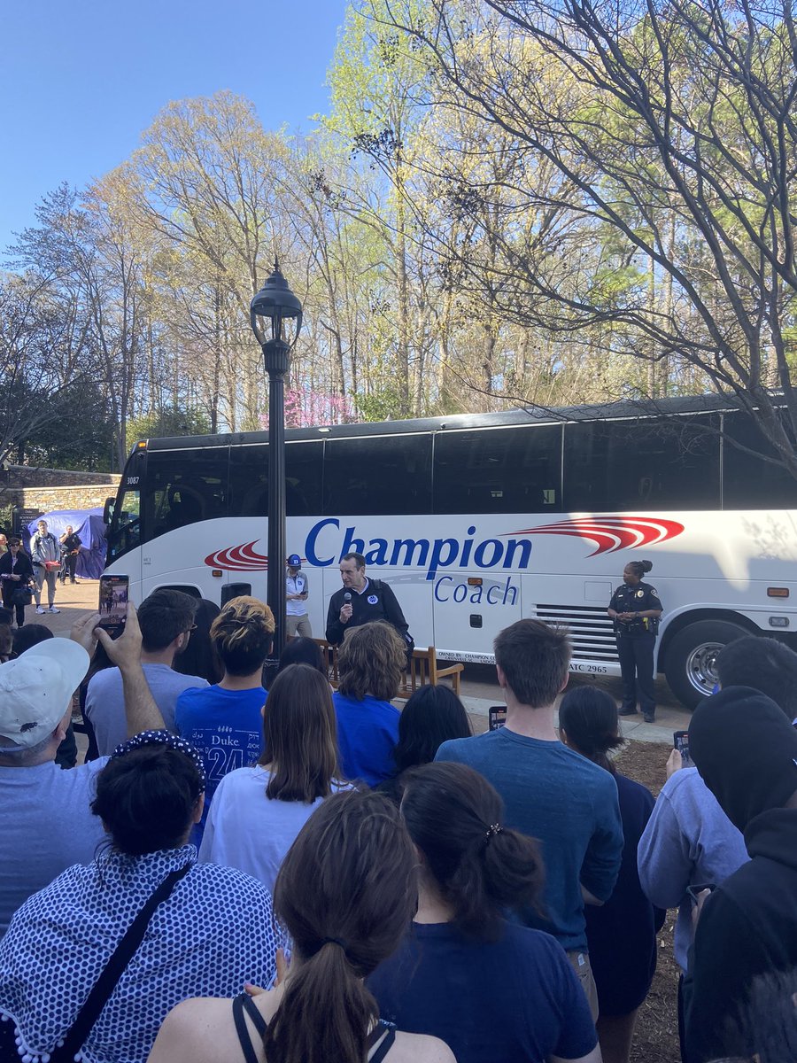 dukebasketball's tweet photo. Students are gathered here outside Cameron Indoor Stadium to greet @DukeMBB as the team buses arrive. Coach K addresses students about his team: “I’m really proud of them.” https://t.co/AX79xwQzNV