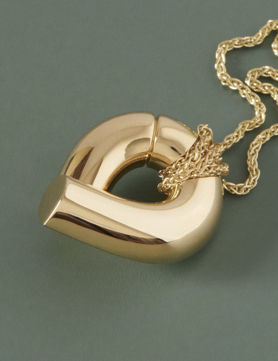 tabayer's tweet photo. #Oera asymmetry, wrapped in @fairminedofficial chain. A protective knot hung from gold links #tabayer #finejewelry https://t.co/57dW5LdqiB