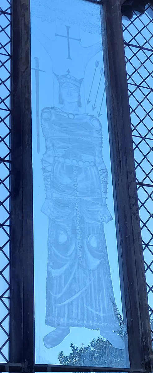 AlabasterMiss's tweet photo. The extremely effective etched image of King Edmund in the chancel by John Hutton, 1971. The original glass was punched out by Dowsing, then a German bomb narrowly missed it but any Victorian glass was shattered. I like the spare use of stained glass to be honest. https://t.co/DtbB1zZEv6