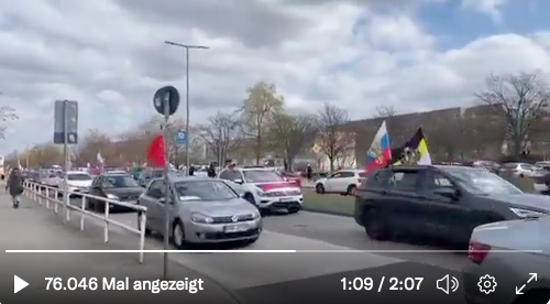 sumlenny's tweet photo. So what do we see at today pro-Russian rally in Berlin? The flags of: a) Russian Airborne troops (raped women in #BuchaMassacre); b) USSR (killed millions of Ukrainians); c) Russian Empire black-gold-white flag (a popular flag of Russian neo-Nazis, compare with a pic from Moscow) https://t.co/x5lYoxMM15