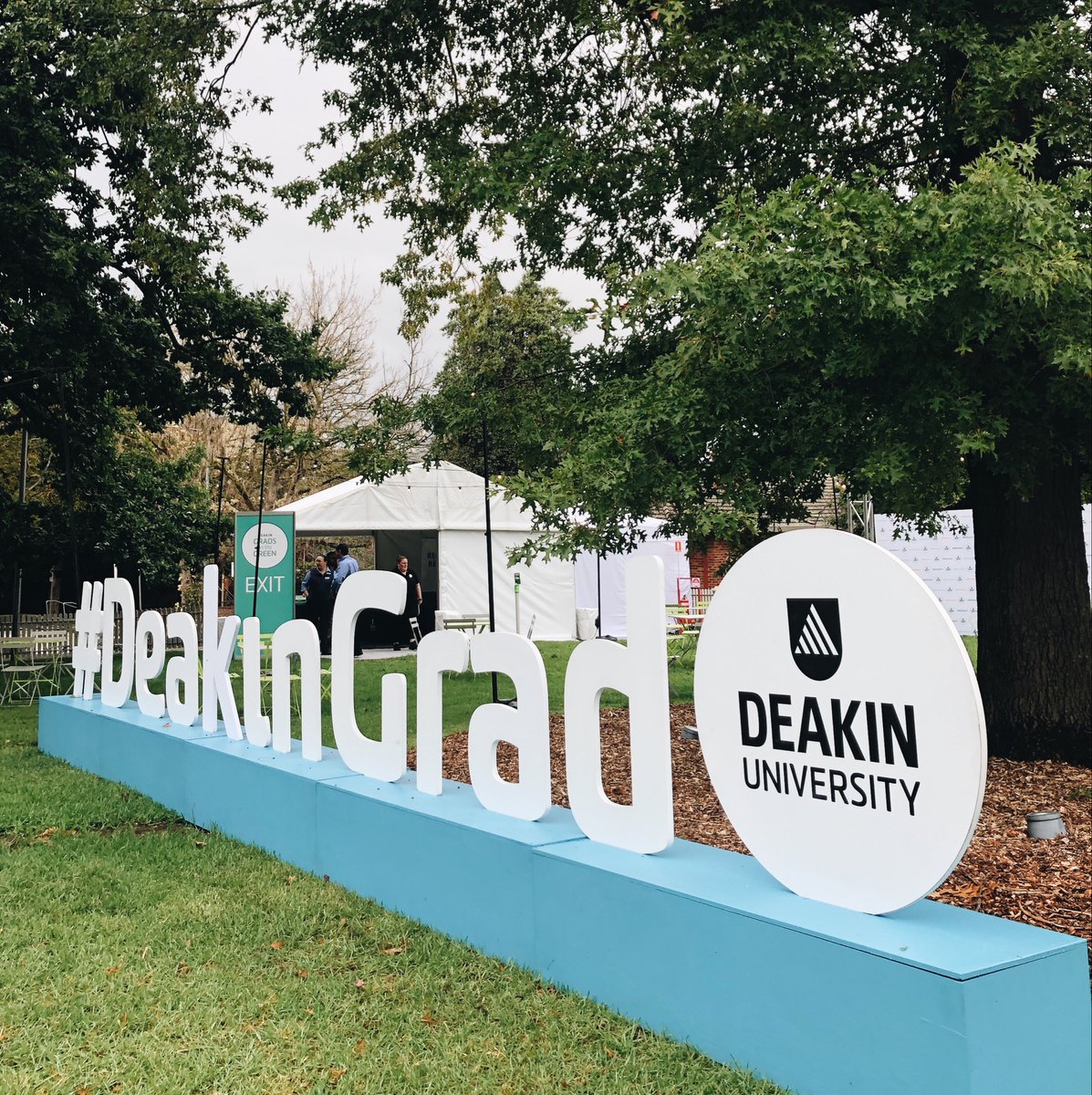 Deakin's tweet image. #DeakinGrad 🎓 | Day one of 'Grads on the Green' has officially kicked off at our #Melbourne Burwood Campus. We can't wait to see you all!