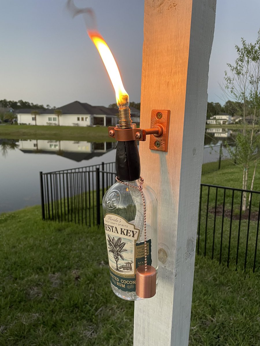 Home made tiki torches with <a href="/SiestaKeyRum/">Siesta Key Rum</a>. Still need 3 more for the back yard…better drink more rum!