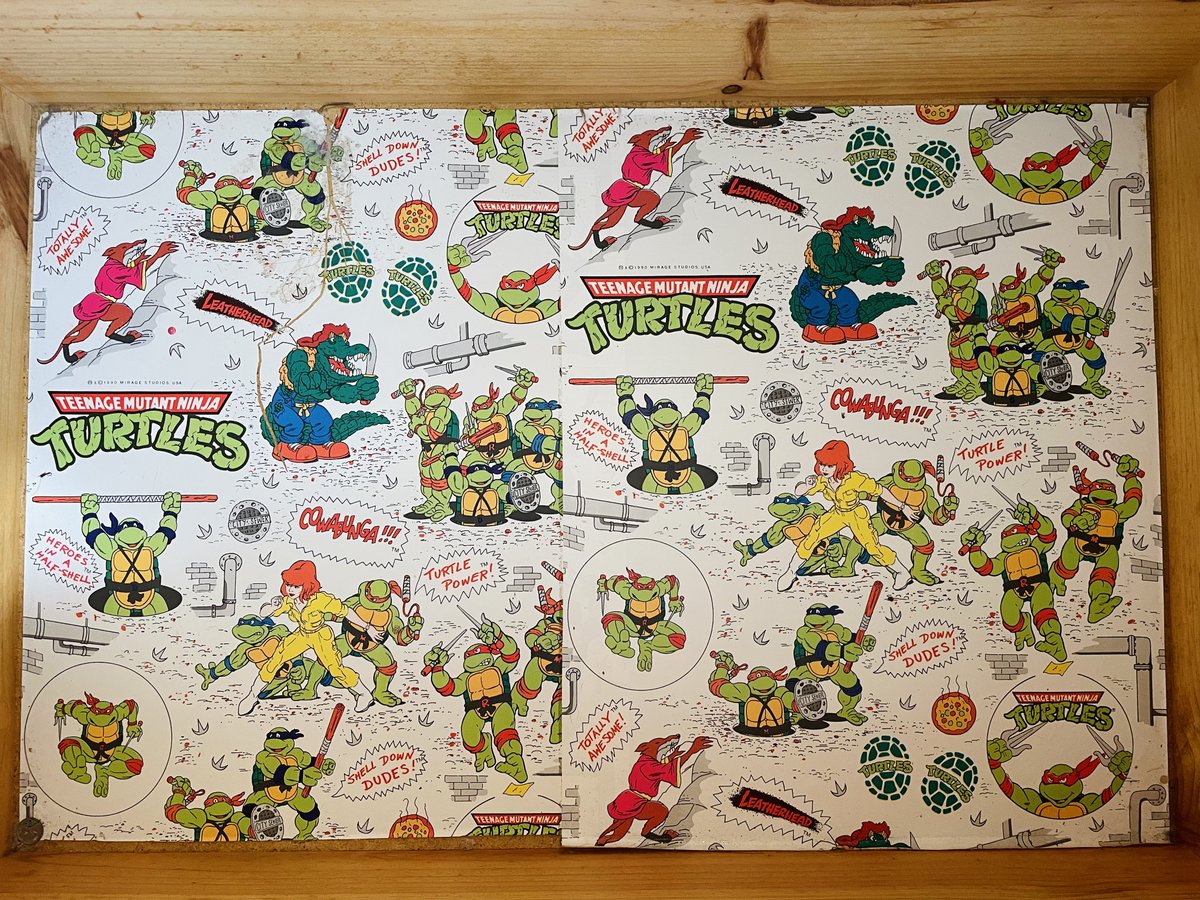 Teenage mutant ninja turtles wallpaper, from presumably the  80s, in amazingly good condition, used as the base of a linen box.