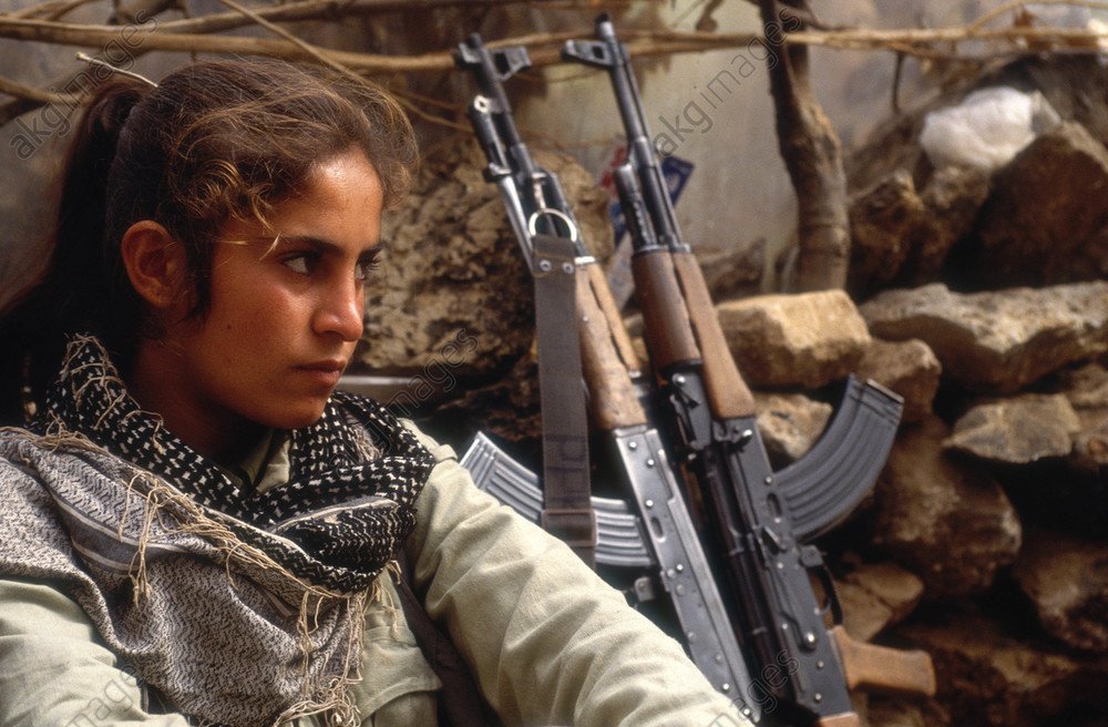 Female fighter of ARGK in military camp, northern Kurdistan 1990s.