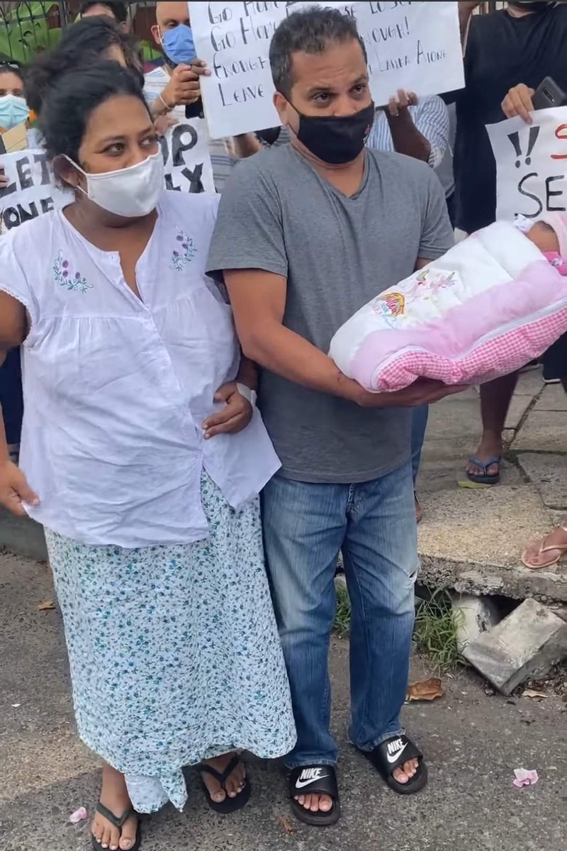 NewsWireLK's tweet photo. Couple with new born baby joins protest https://t.co/vuvIw1WOWj