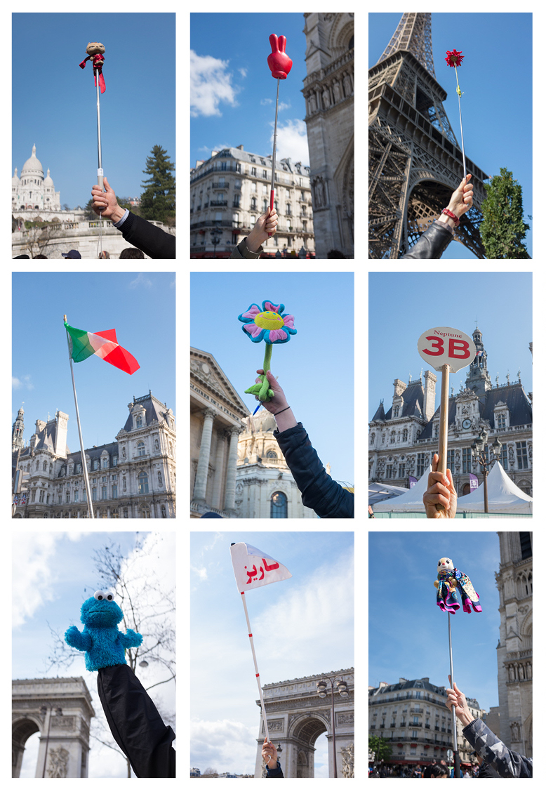 adrian_sken's tweet photo. In my series Follow the Guide, i see things from the paris tourists' point of view, capturing the unexpected props raised by their guides. Car antenna, selfie stick, wooden stick, teddy bear, plastic flowers, and other makeshift objects are held in front of the blurred monuments. https://t.co/e7kGDr9cGw