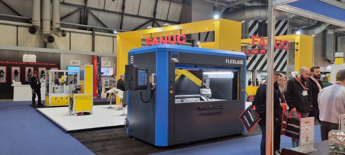 CyanTecSystems's tweet photo. The opening day of the @MACHexhibition 2022 has finally arrived. It's great to see people back and we are delighted to be part of the Fanuc UK stand showing our Flexlase laser processing cell. Come and see us in Hall 17 on stand 130 #Laser #Automation https://t.co/Y7fWYfsjjy
