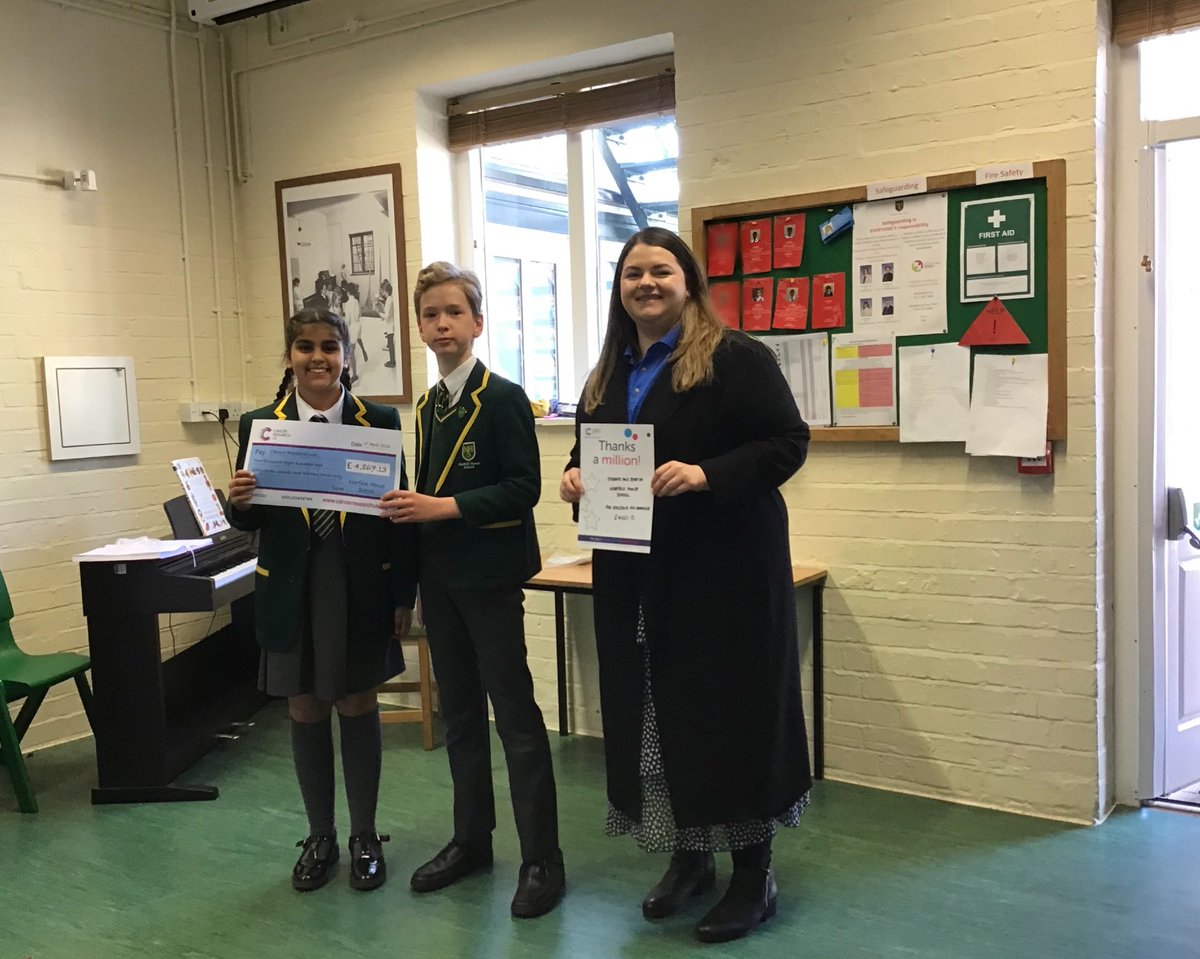 Our newly appointed Head Boy, Thomas and Head Girl, Beant presented a cheque for £4,867.13 to Cancer Research in our celebration assembly.