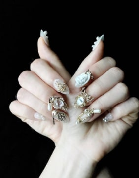 MelissaEleche's tweet photo. On a whim, make your own Gong Yan nails🌞🌞 https://t.co/LLscy0sizc