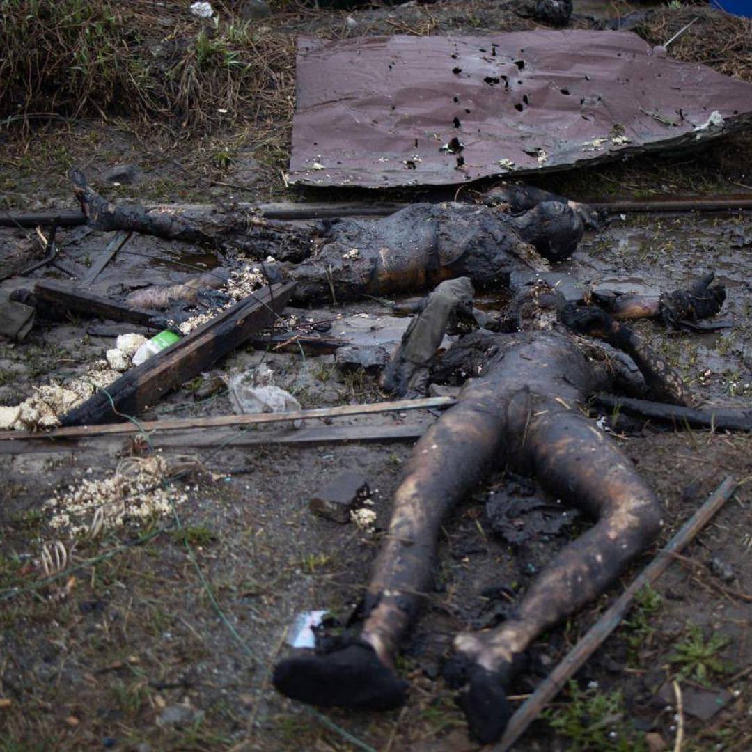 Sega__Saga's tweet photo. Every day, more and more horrific footage of the bodies of civilian Ukrainians tortured and killed by the Russian occupiers in #Bucha appears.  Every inhabitant of Russia should see these photos. Each of them is responsible for this.

This is not just a war - this is #Genocide https://t.co/mv0afzMqw9
