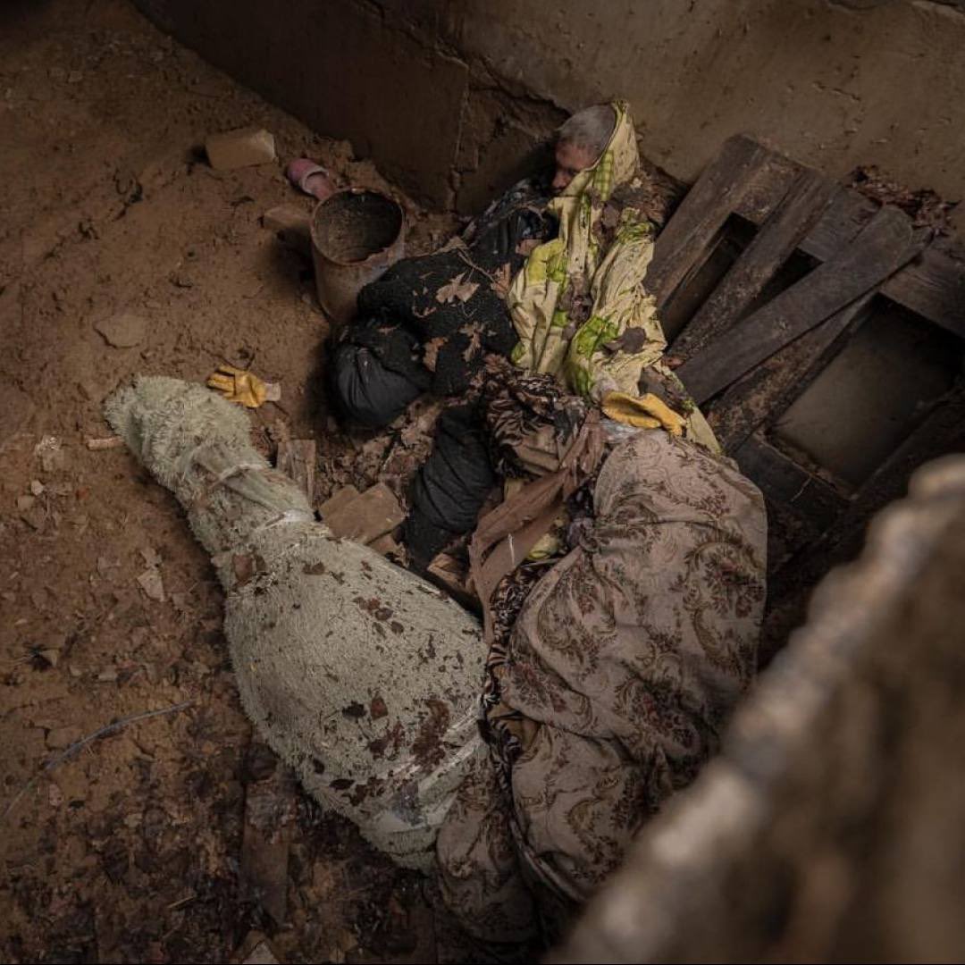 Sega__Saga's tweet photo. Every day, more and more horrific footage of the bodies of civilian Ukrainians tortured and killed by the Russian occupiers in #Bucha appears.  Every inhabitant of Russia should see these photos. Each of them is responsible for this.

This is not just a war - this is #Genocide https://t.co/mv0afzMqw9