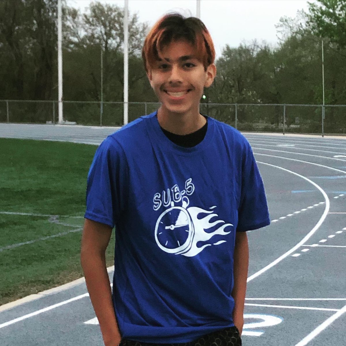 CoachMeuth's tweet photo. Cristo EARNED his sub 5 shirt at the Thrall Relays this past week! 
⏱ New mile PR of 4:52 🔥 https://t.co/hq52ZxIGDc