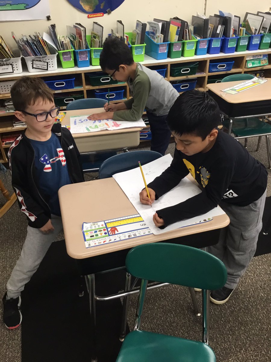 CRASMrsEnnis's tweet photo. Finishing our scripts for our Phonics Professor commercials. We can construct and demolish words like experts! #TCRWP #UOSPhonics #fts4rkids https://t.co/UlqjiAgcZy