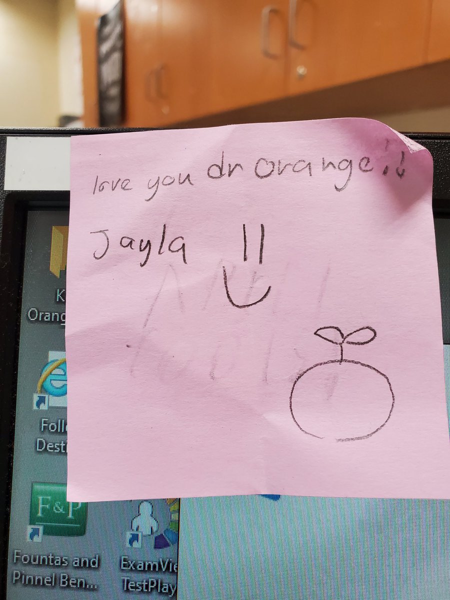 On my desktop this morning. She must have left it there Friday afternoon after dismissal. She puts the chromebooks away every day while I dismiss her classmates. And so begins my Monday. Have a great day!🟠🧡🍊 #DrOrangeJones #Jayla #teacherspet
