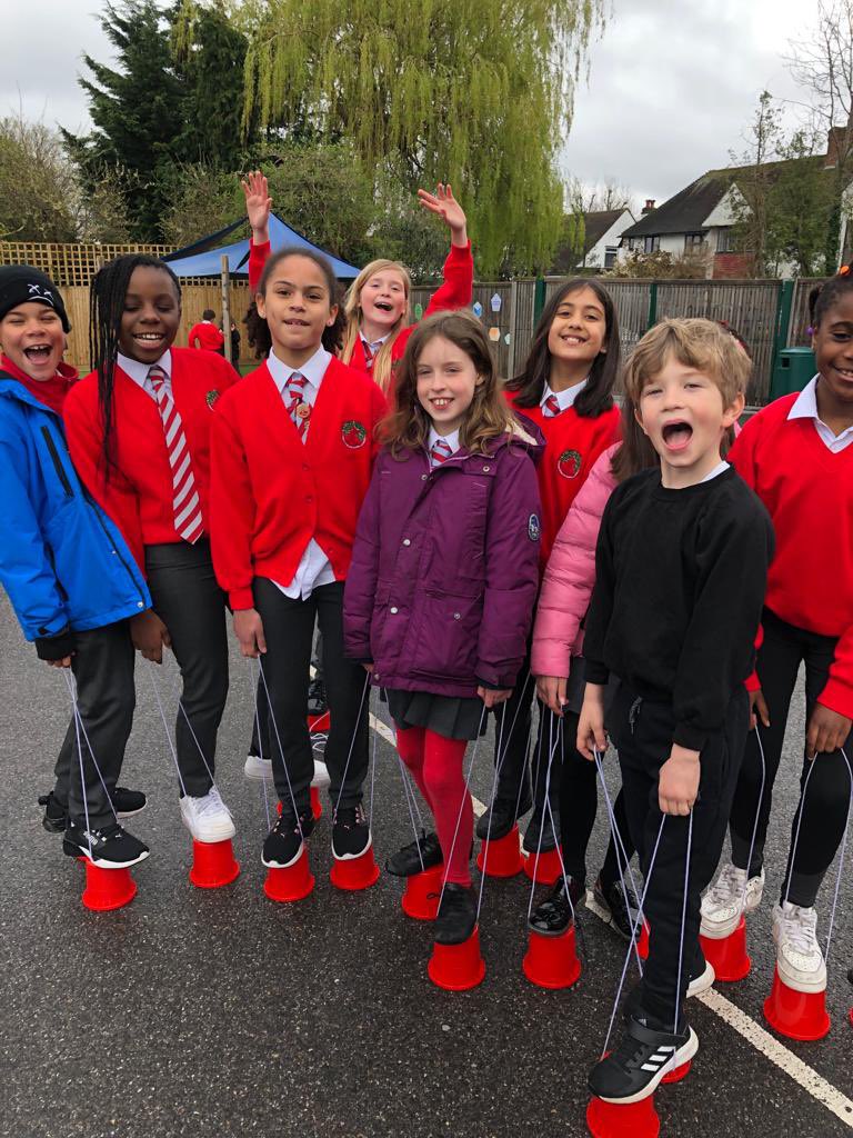 CCJacademy's tweet photo. The rain stopped and the children were able to enjoy our craze of the week is… stilts! @LEOacademies @theresehoyle https://t.co/8RTKXWrIV8