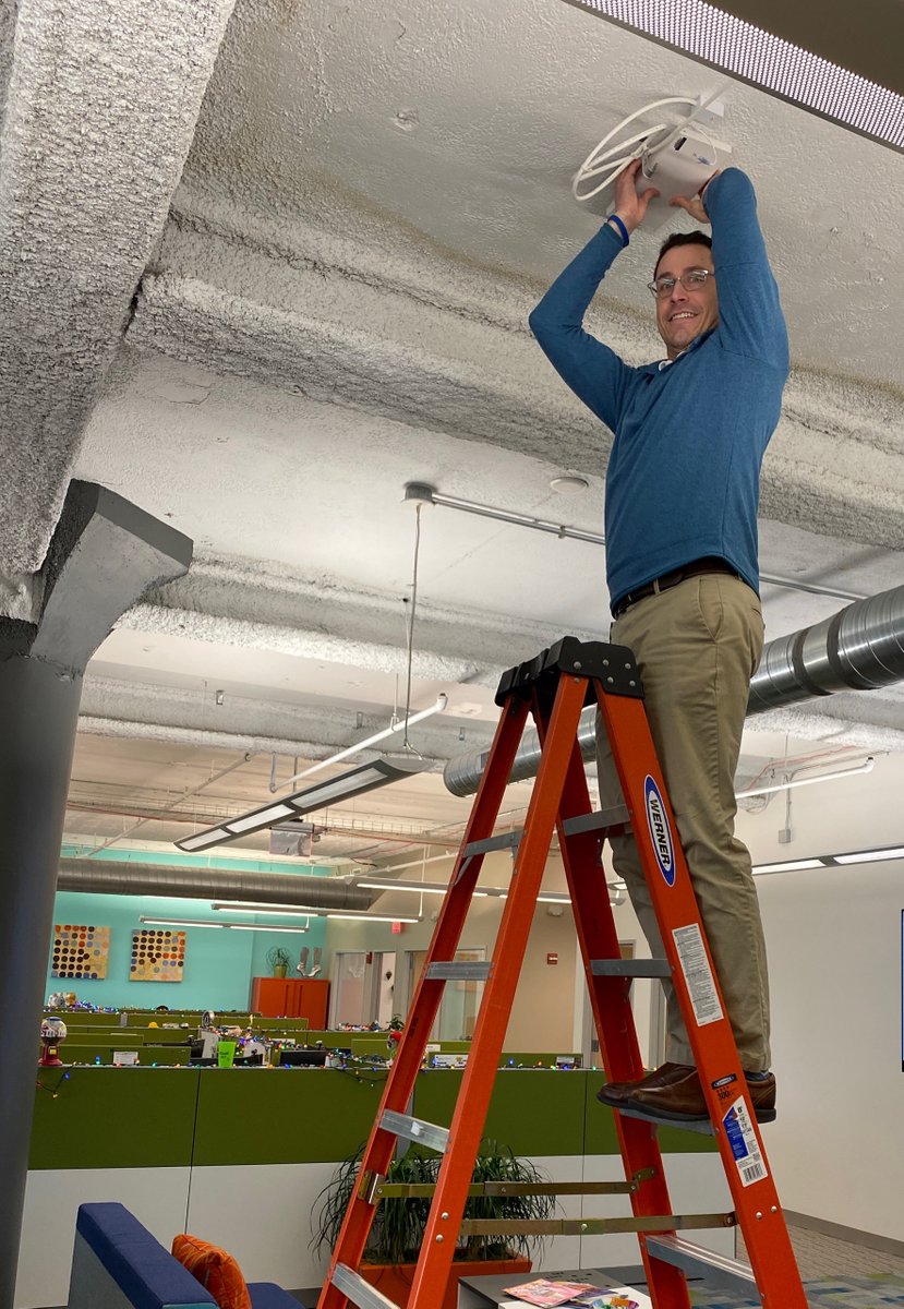 FITtech's tweet photo. Chief Technology Officer Jason Collins is taking technology to new heights by swapping out an access point and doing some testing in the office ✅

#FITtechnologies #testing #hardware https://t.co/yYEoYfydG5