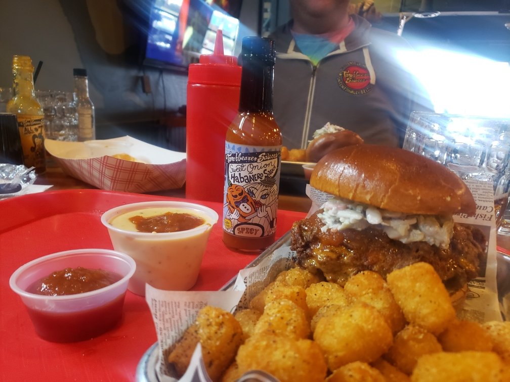 The new Sweet Onion Habanero has got to be one of our best creations! Here it is again improving an already tasty buffalo chicken sandwich and various tot dipping sauces.