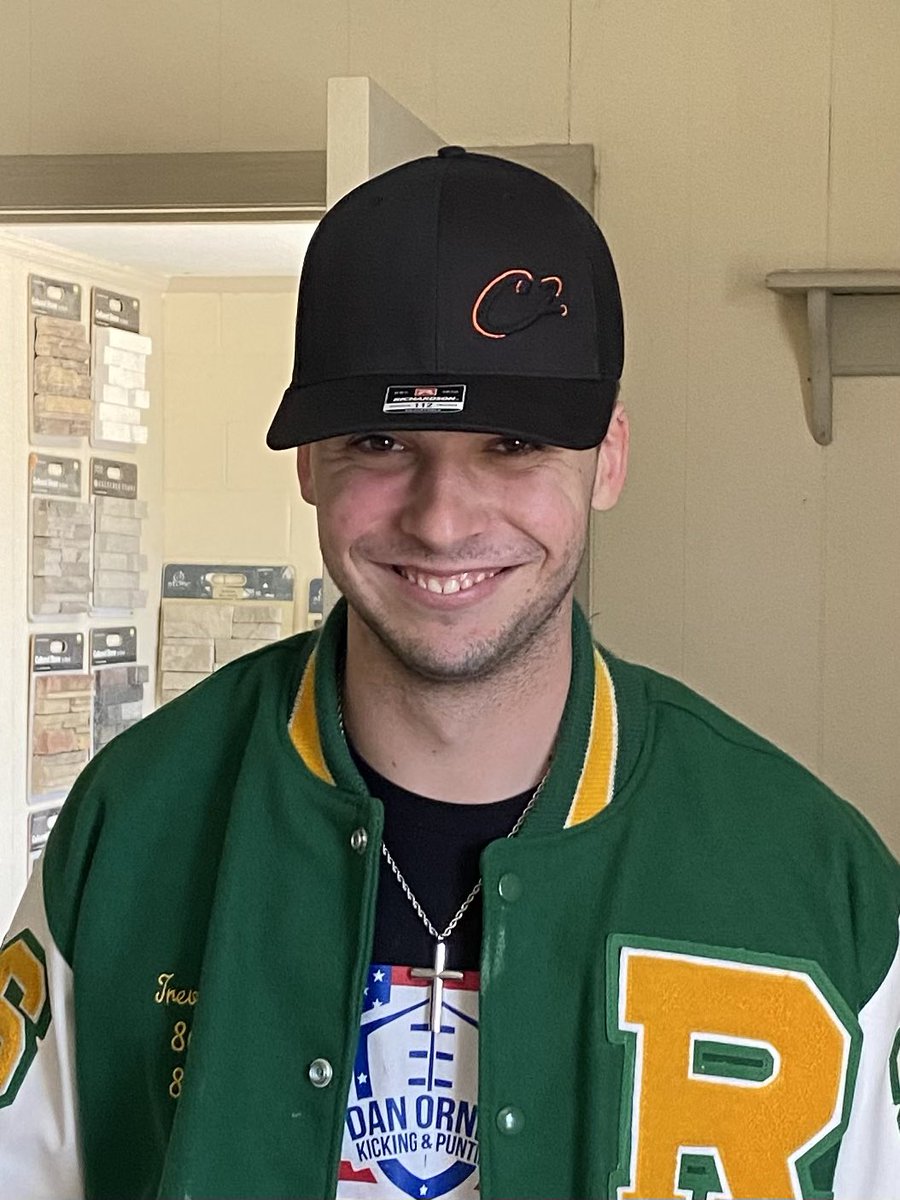 SquaredCarolina's tweet photo. @GoCamelsFB Kicker, @TrevorMoss17, has a C2 hat to match those black uniforms now!🐪
@FbRichmond 
#C2Outdoors https://t.co/62P7Gr8M97
