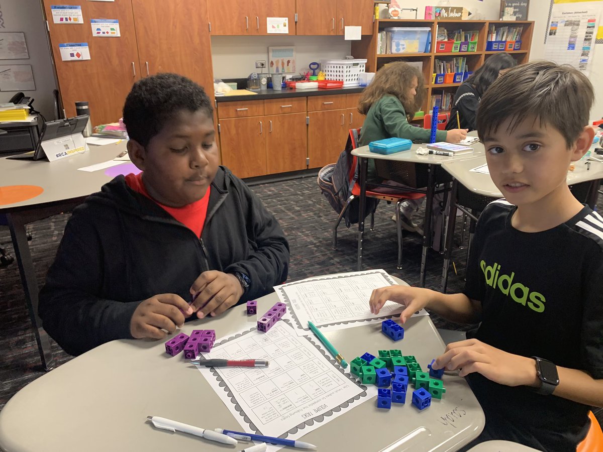 Icenhower4VAISD's tweet photo. We are using cubes to help us explore the concept of volume! #wedomath #ThePrestonPride #PESyear5 https://t.co/LCNTww1y8W