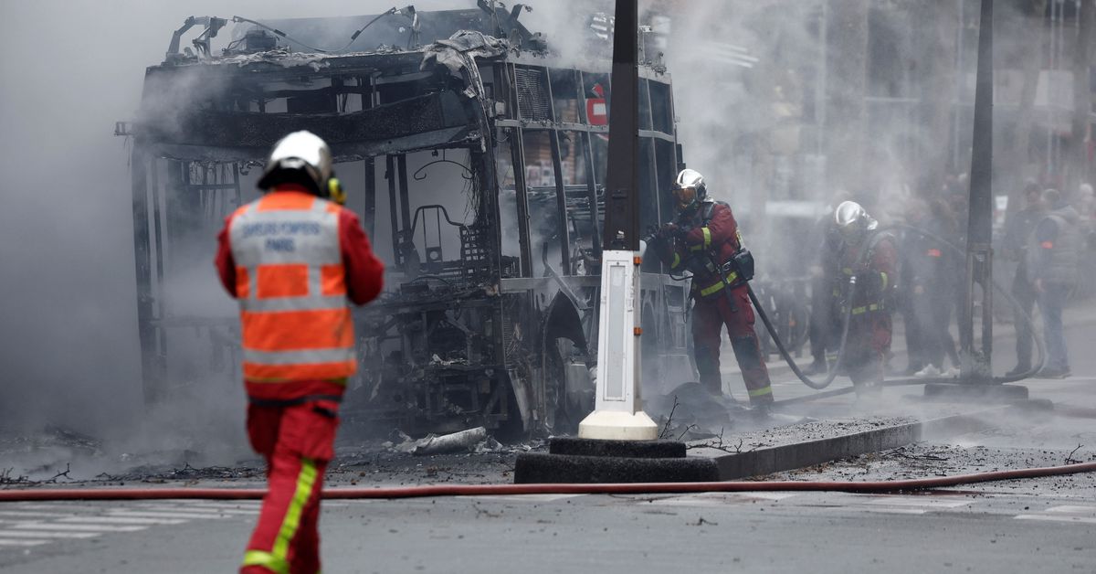 Reuters's tweet photo. Burning bus sends clouds of black smoke into Paris sky https://t.co/00l5rguTP2 https://t.co/bxsEVssrs0