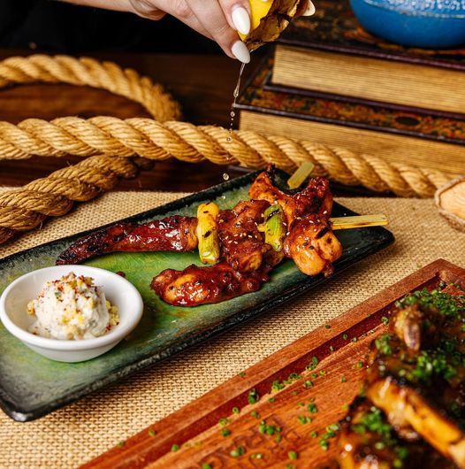 Just a squeeze 🍋 atop our Gochujang BBQ Octopus 🐙 to give it a citrus kick! This dish is great for sharing &amp; served with a side of Korean Potato Salad. #DrunkenDragon