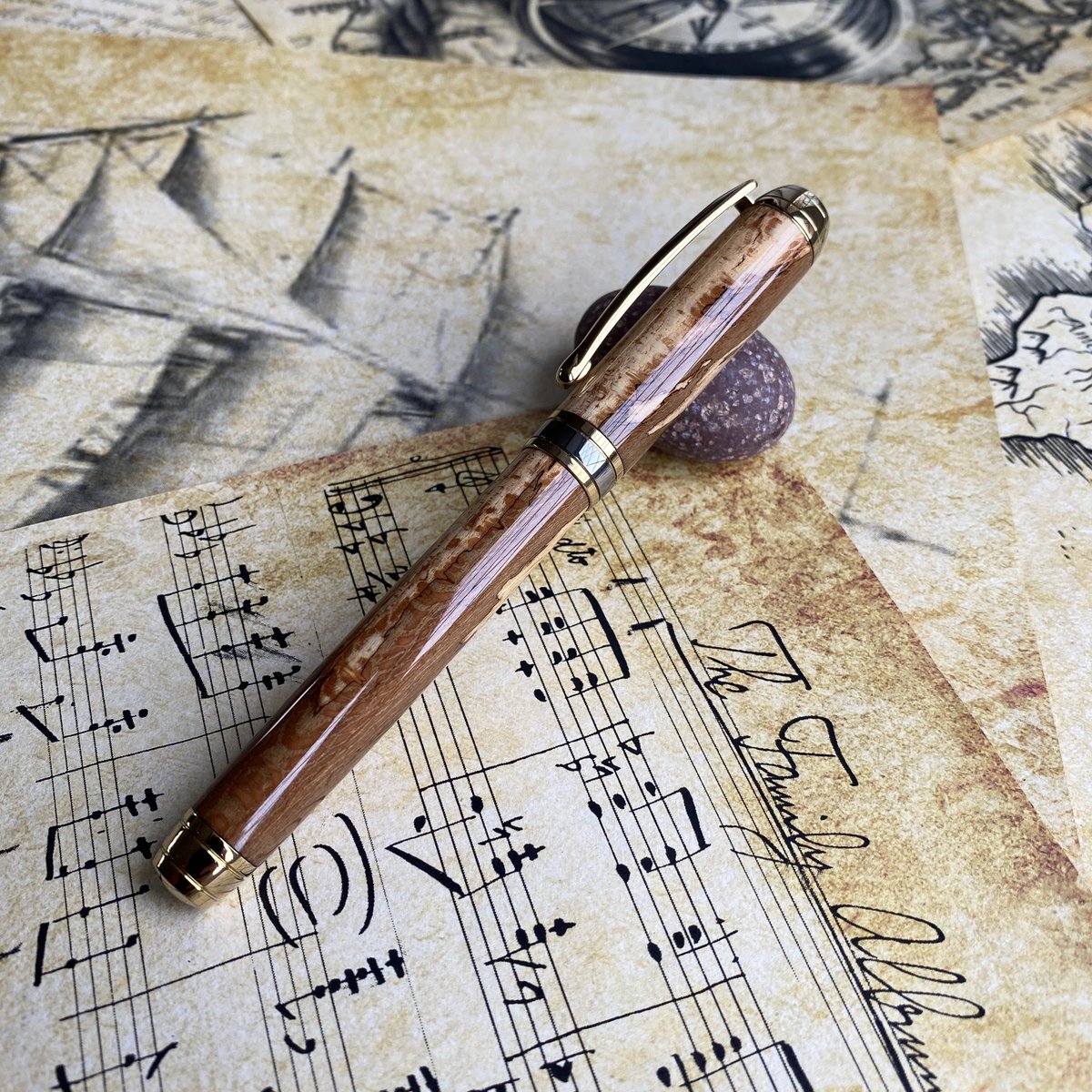craftynickpens's tweet photo. A gold titanium fountain pen dressed in spalted walnut https://t.co/HFh0GLOXm5