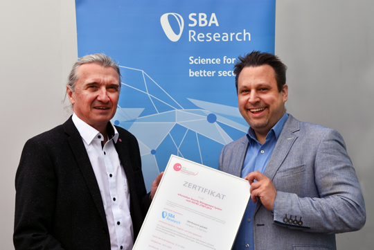 SBA_Research's tweet photo. SBA Research Professional Services is now officially #certified according to ISO/IEC 27001:2013. On March 30th Wolfgang Resch (OCG) handed over 🤝 the #iso #certificate to our CISO and head of Professional Services Stefan Jakoubi @stefanthej https://t.co/CTyHyJHVGx https://t.co/YaTQ6QdyEO