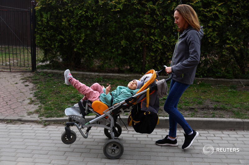 The Wider Image: Play and therapy pool ease trauma for Ukrainian refugee girl in Poland reut.rs/3ubgISc 📷 <a href="/hannahmckay88/">Hannah McKay</a>